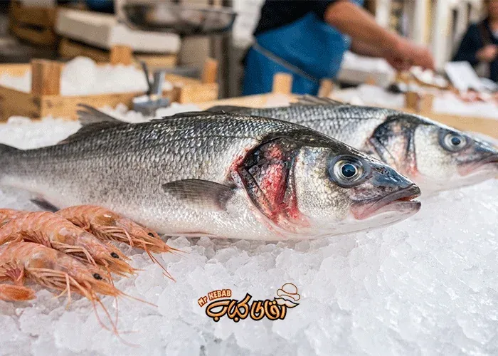 Signs of freshness in fish and shrimp: clear eyes, red gills, and shiny skin.