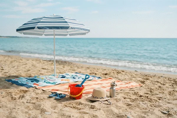 Essential items for the beach with a young child during a family trip to Gilan