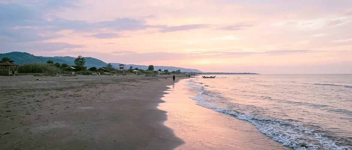 The peaceful atmosphere of Chamkhaleh Beach is ideal for a couple's getaway.